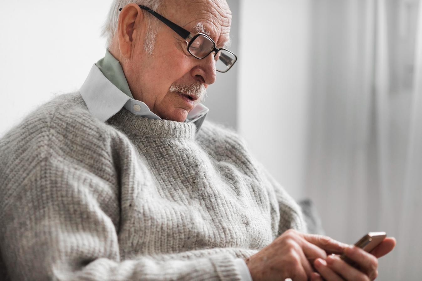 man-looking-at-phone