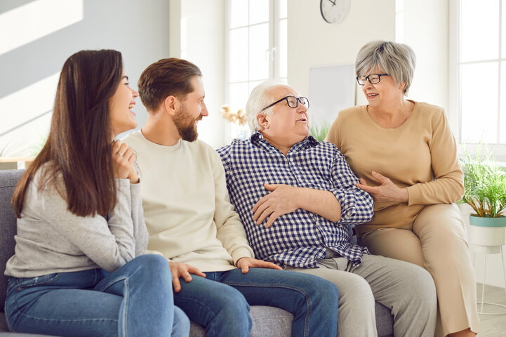 Happy family, aging old parents and adult children, two generations spending good time together at home.,Senior people, grown kids in loving kind affection, trust, family care, peace over generations
