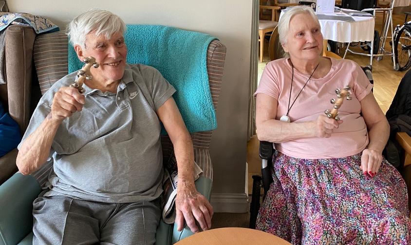 residents singing along with instruments