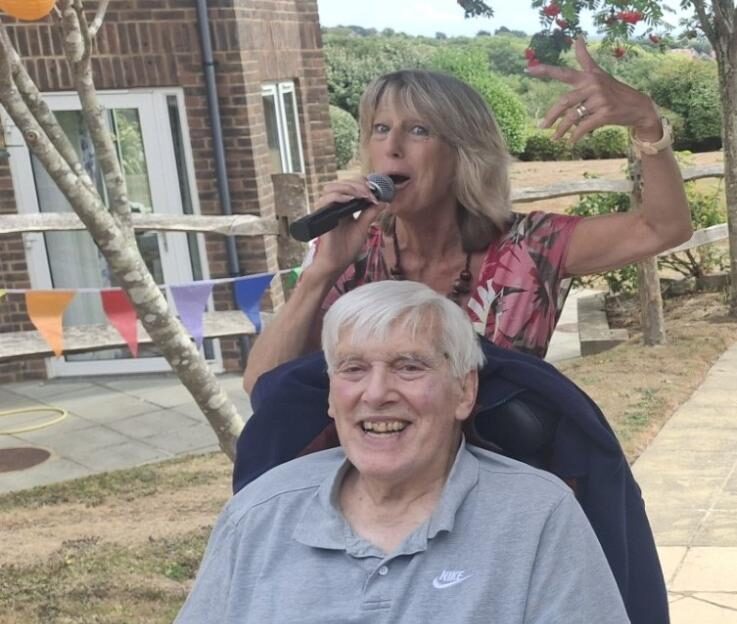 resident and entertainer in garden